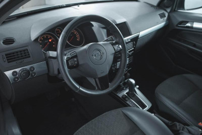 Opel Astra 1.8 AT (110 л.с.)