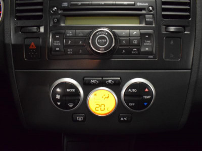 Nissan Tiida 1.6 MT (110 л. с.)