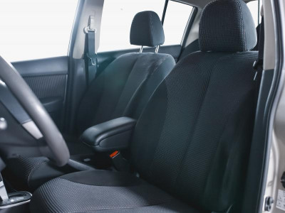 Nissan Tiida 1.6 AT (110 л. с.)