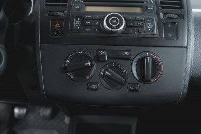 Nissan Tiida 1.6 MT (110 л. с.)